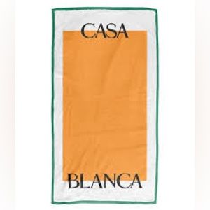 New in original packaging CASABLANCA orange beach towel NWT